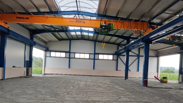 Skladovacia hala pre poľnohospodársku techniku, KOS real Chyšná s.r.o.