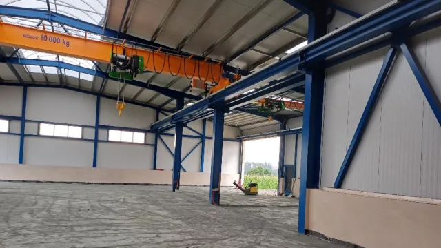 Skladovacia hala pre poľnohospodársku techniku, KOS real Chyšná s.r.o.