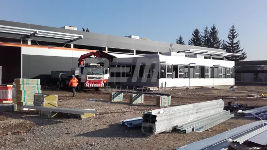 Skladovacia hala s administratívnou časťou PAP-PEX 60m - Montáž fóliovej strechy a panelov
